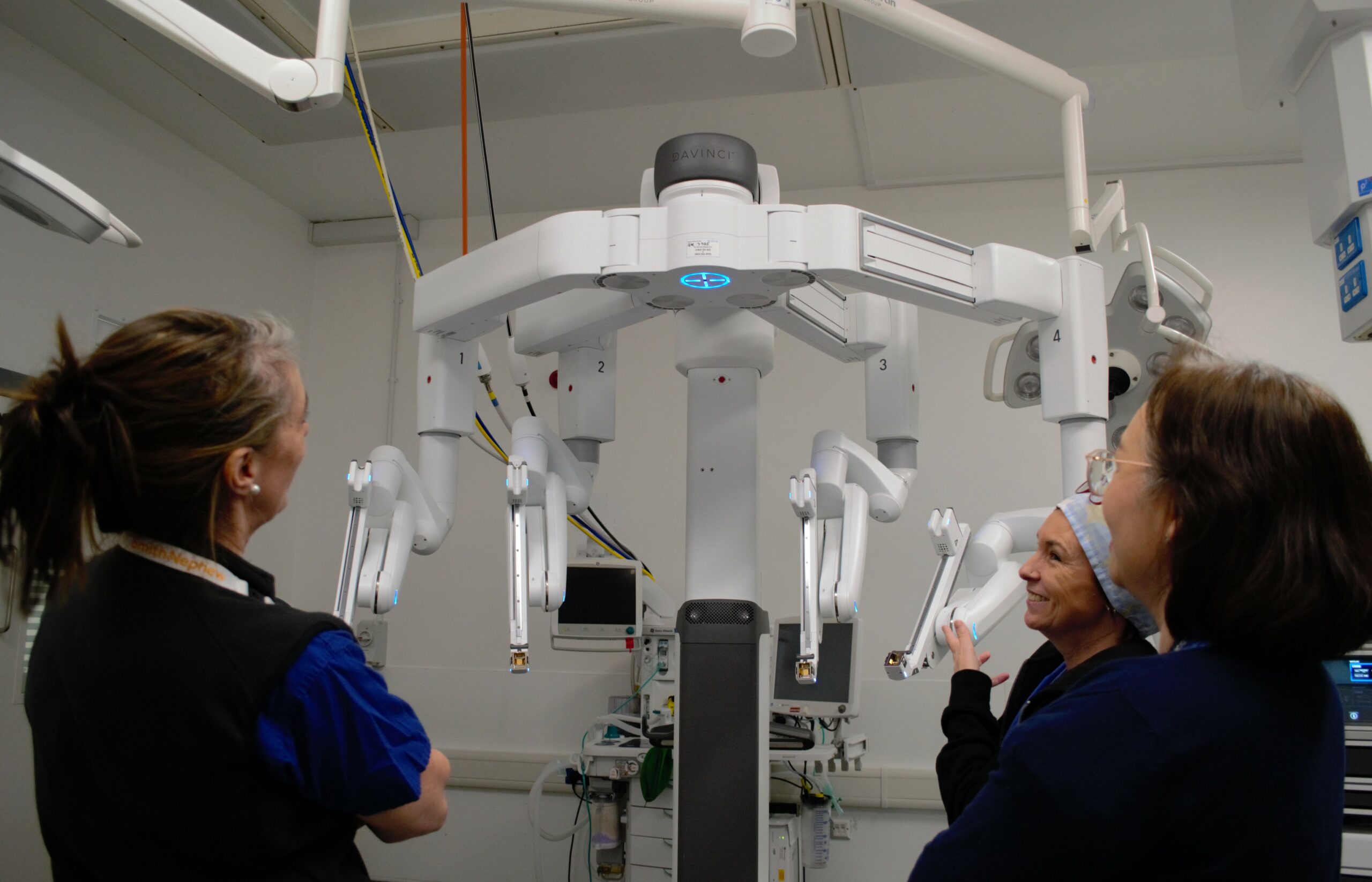Theatre Matron and team with surgical robot